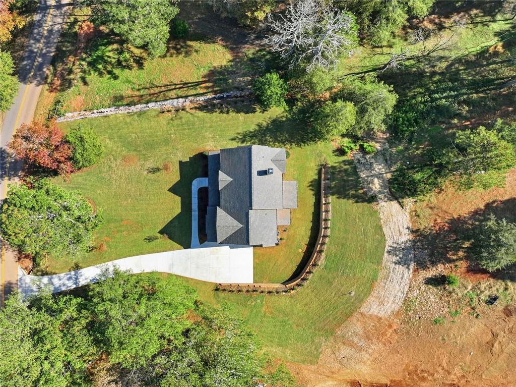 420 Stock Gap Road Southwest Monroe, GA 30656 - Photo 6 of 50 an aerial view of a house with a yard