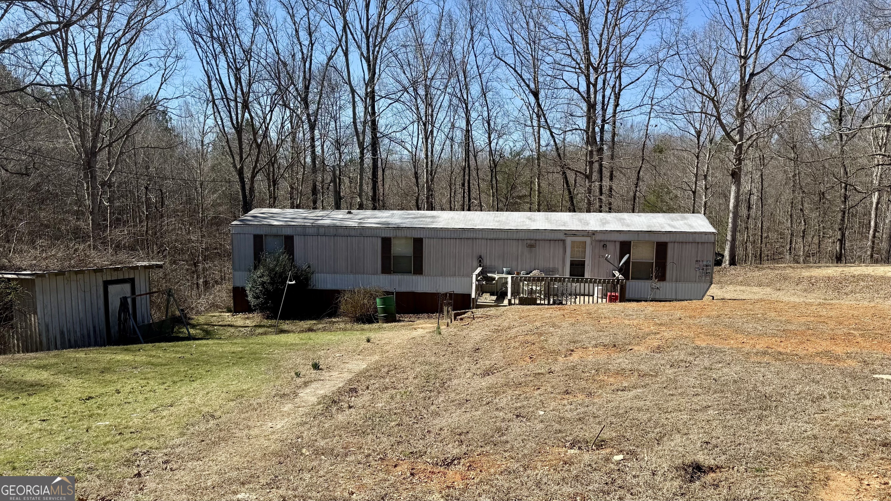 1177 Twin River Orchard Road Demorest, GA 30535 - Photo 2 of 3 a view of a house with a yard covered in snow