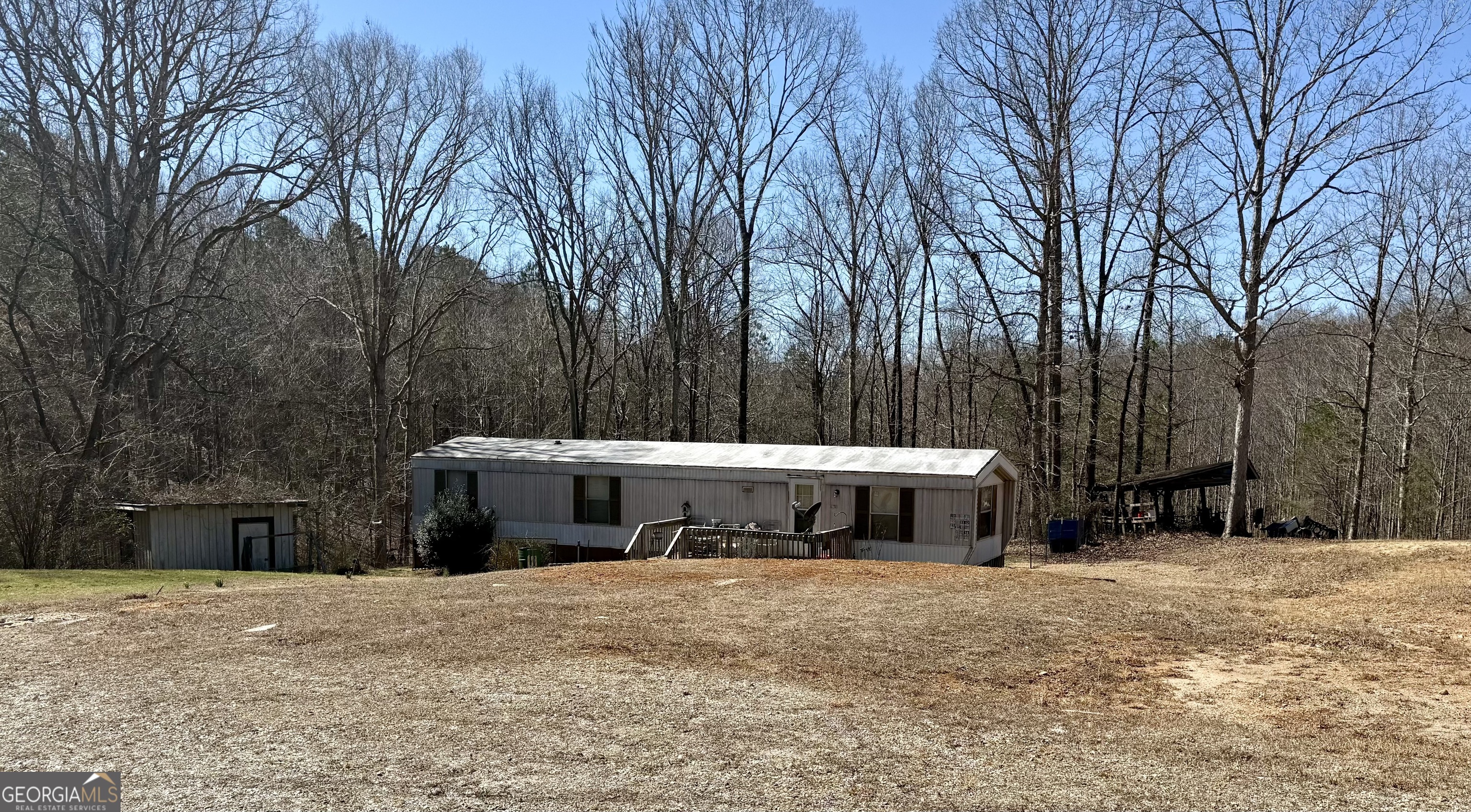 1177 Twin River Orchard Road Demorest, GA 30535 - Photo 3 of 3 a front view of a house with a yard and covered with snow