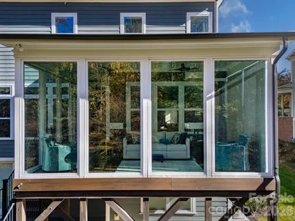 a view of a door and a window