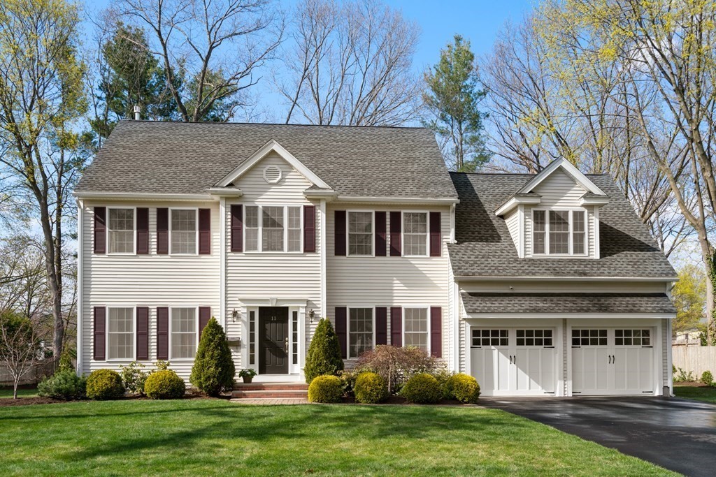 11 Shadow Lane Wellesley, MA 02482 - Photo 1 of 37 a front view of a house with a yard
