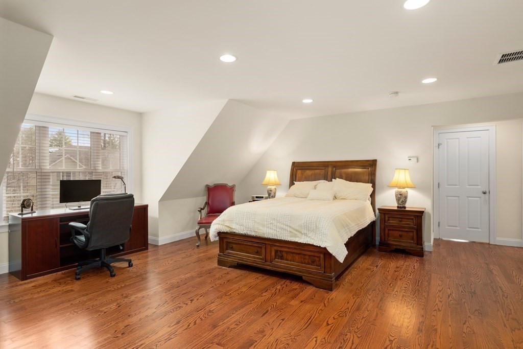 11 Shadow Lane Wellesley, MA 02482 - Photo 16 of 37 a bedroom with a bed and furniture