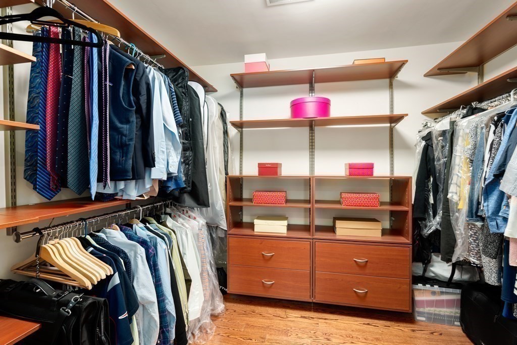 11 Shadow Lane Wellesley, MA 02482 - Photo 18 of 37 a view of walk in closet with clothes