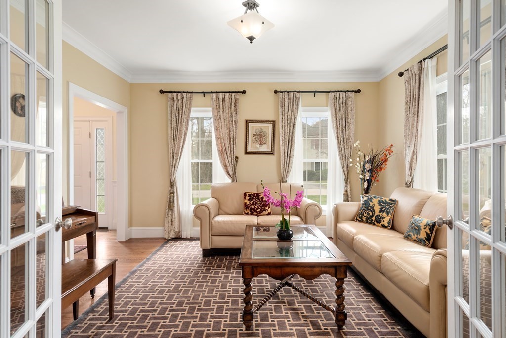 11 Shadow Lane Wellesley, MA 02482 - Photo 2 of 37 a living room with furniture and a large window