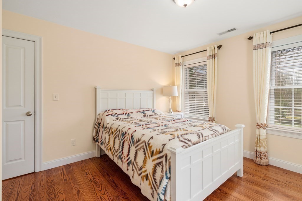 11 Shadow Lane Wellesley, MA 02482 - Photo 25 of 37 a bedroom with a bed and a window