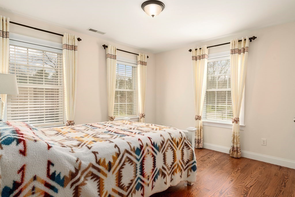 11 Shadow Lane Wellesley, MA 02482 - Photo 26 of 37 a bedroom with a bed and a window
