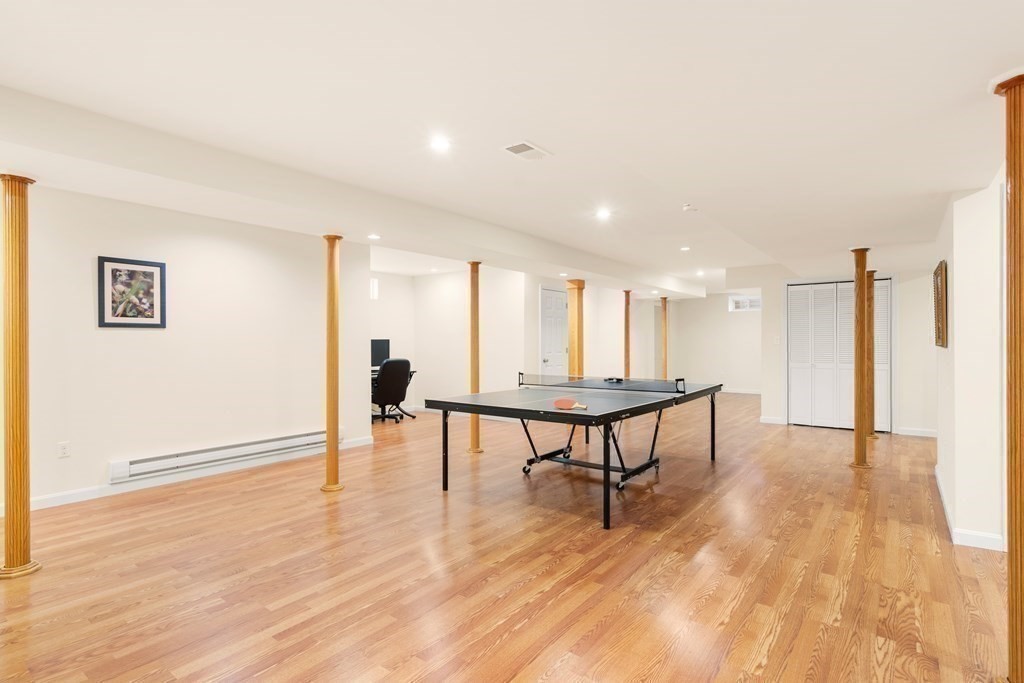 11 Shadow Lane Wellesley, MA 02482 - Photo 29 of 37 a view of a room with furniture and wooden floor