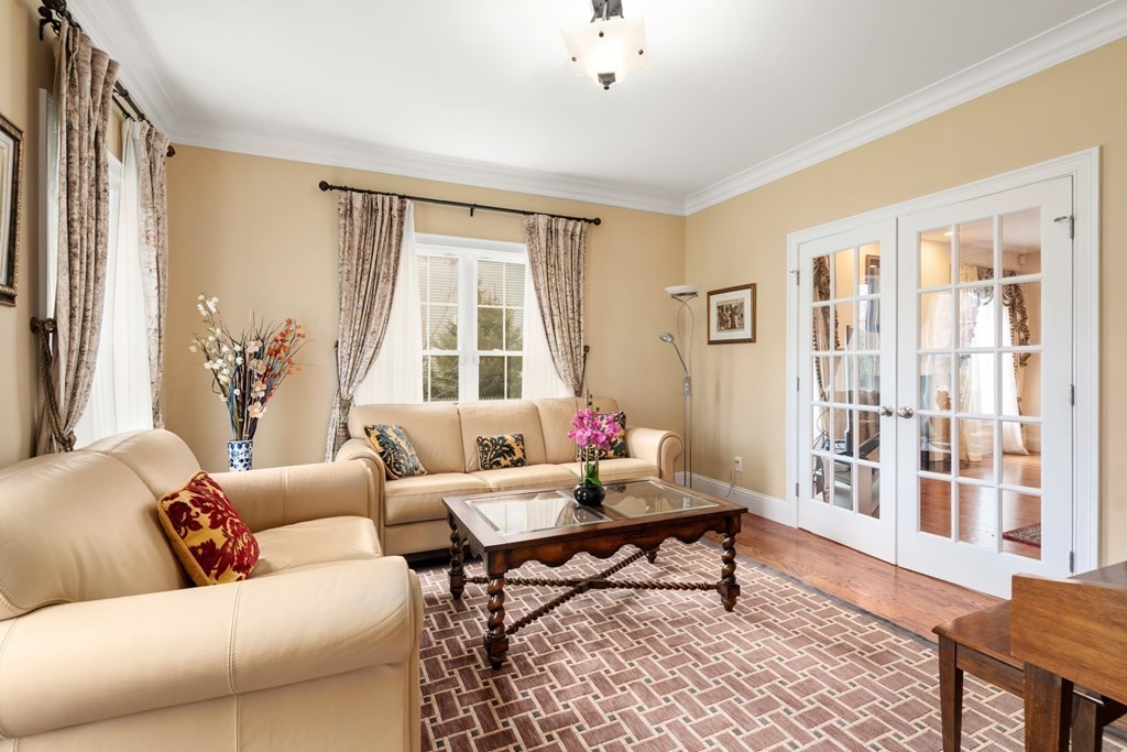 11 Shadow Lane Wellesley, MA 02482 - Photo 3 of 37 a living room with furniture and windows