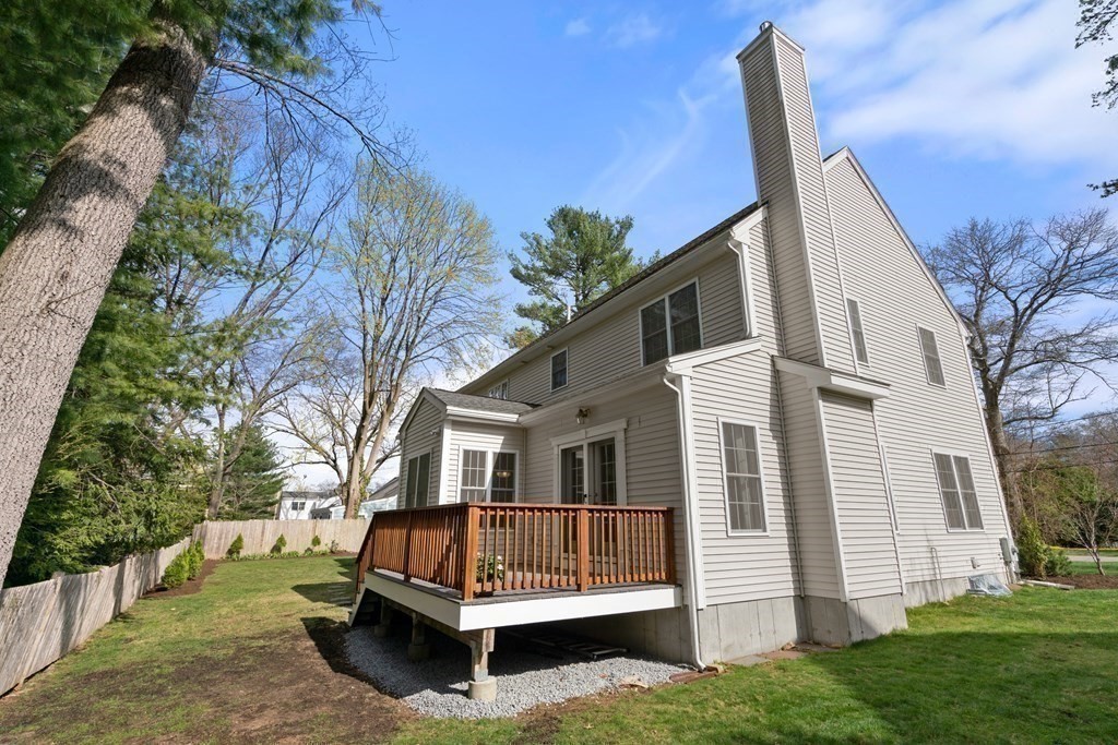 11 Shadow Lane Wellesley, MA 02482 - Photo 31 of 37 a view of a house with a yard