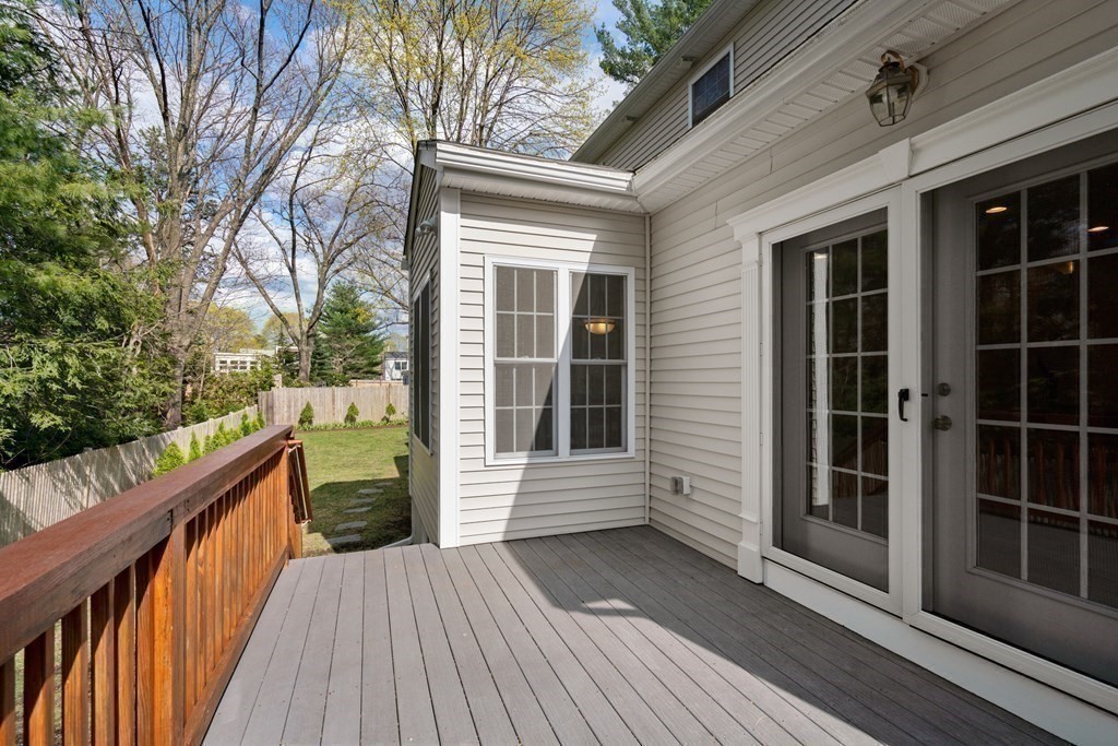 11 Shadow Lane Wellesley, MA 02482 - Photo 32 of 37 a view of balcony with wooden floor and fence