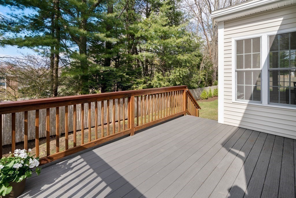 11 Shadow Lane Wellesley, MA 02482 - Photo 33 of 37 a balcony with wooden floor and fence