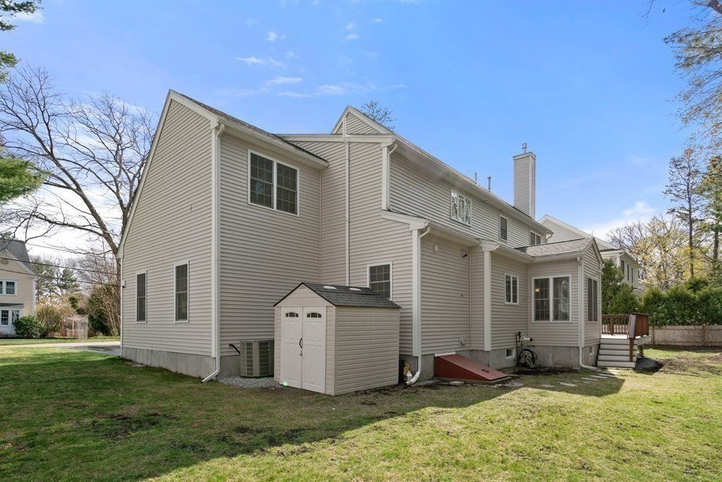 11 Shadow Lane Wellesley, MA 02482 - Photo 34 of 37 a view of a house with backyard