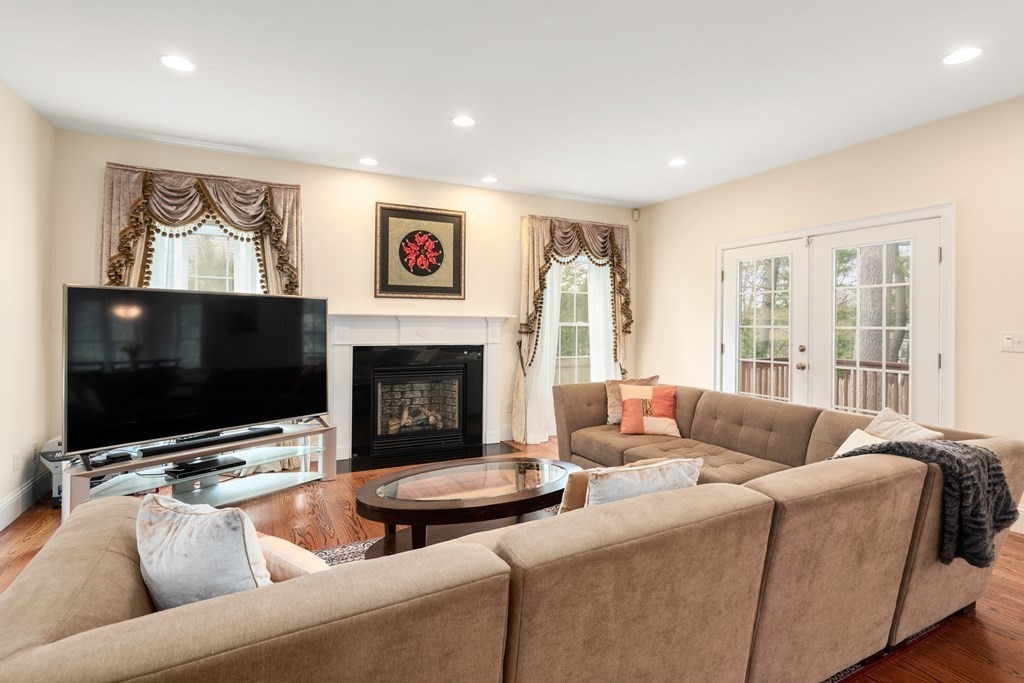 11 Shadow Lane Wellesley, MA 02482 - Photo 6 of 37 a living room with furniture and a flat screen tv