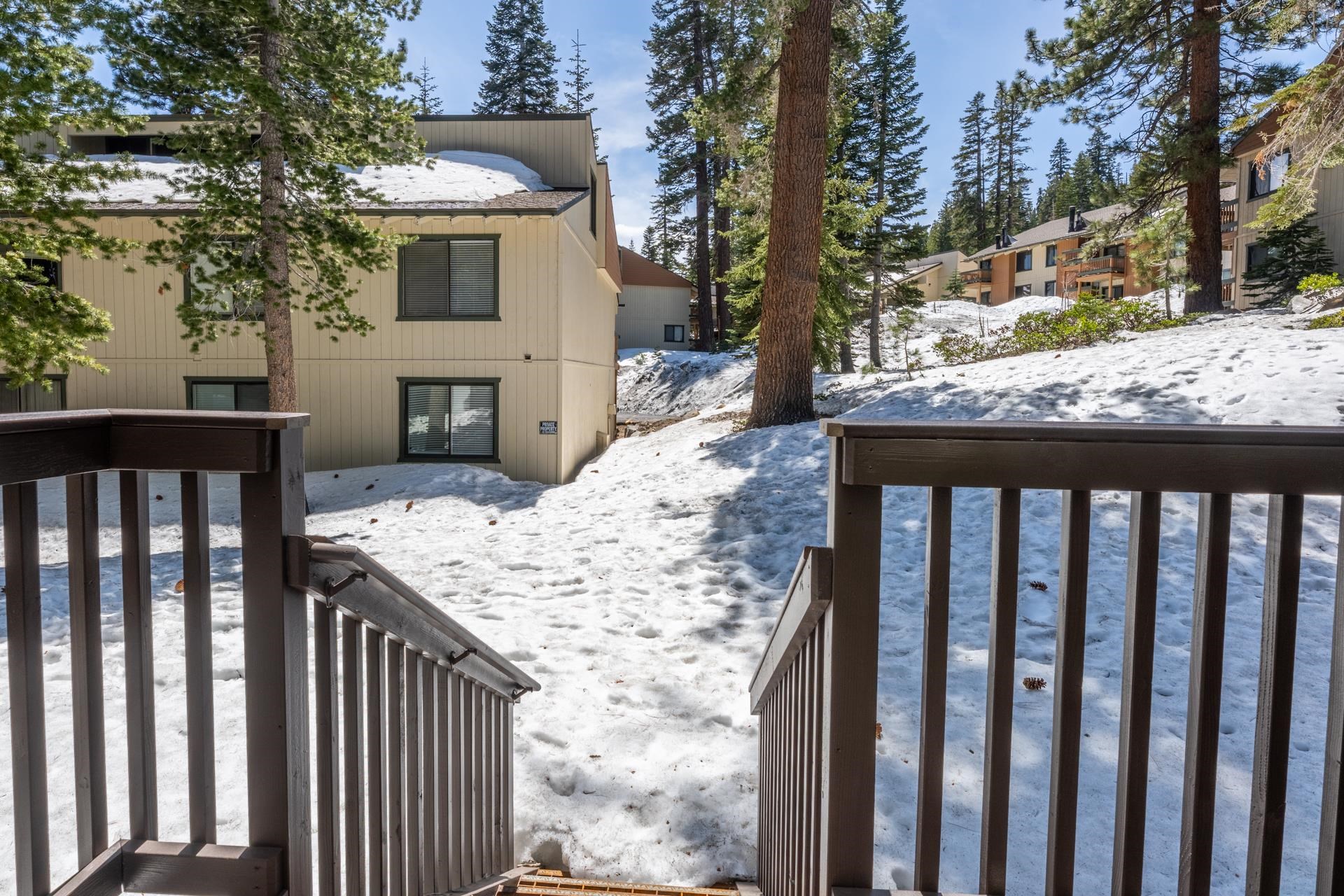 125 Davison Road, Unit 1 Mammoth Lakes, CA 93546 - Photo 45 of 46 a view of a house with a wooden fence