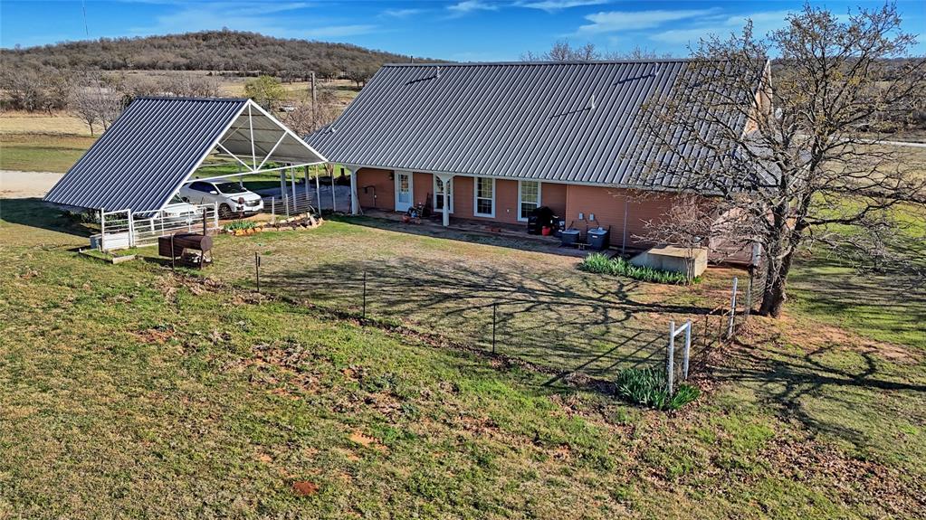 4460 Hildreth Pool Road Bowie, TX 76230 - Photo 28 of 40 a view of house with a yard