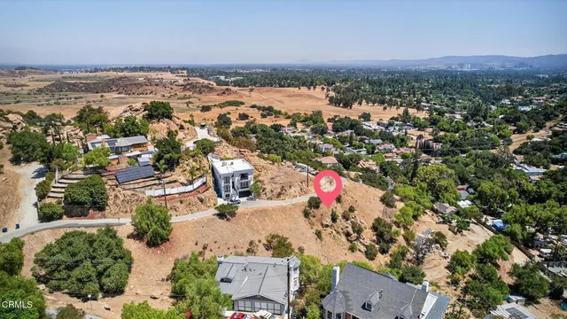 an aerial view of a city with lots of residential buildings