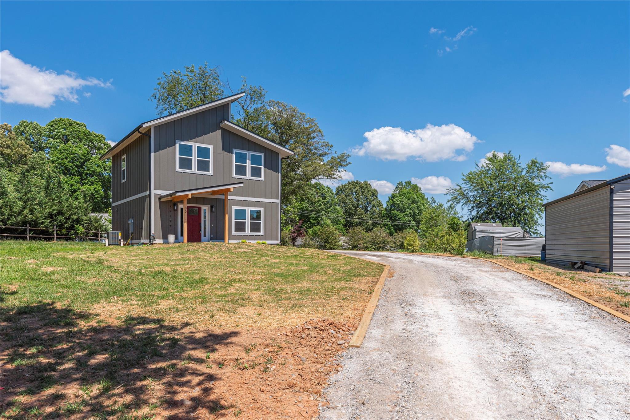 32 Oak Hill Road Candler, NC 28715 - Photo 26 of 29 a front view of a house with a yard