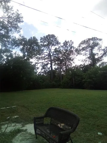 a view of a golf course with a yard