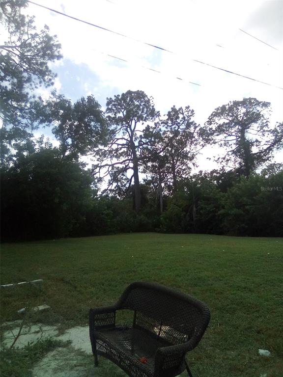 a view of a golf course with a yard