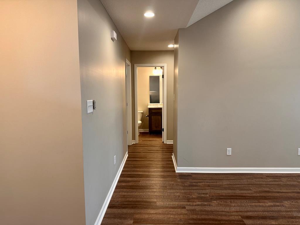 4603 Brees Way Valdosta, GA 31601 - Photo 19 of 31 a view of a hallway with wooden floor