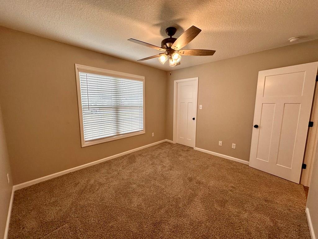 4603 Brees Way Valdosta, GA 31601 - Photo 20 of 31 a view of an empty room with a window