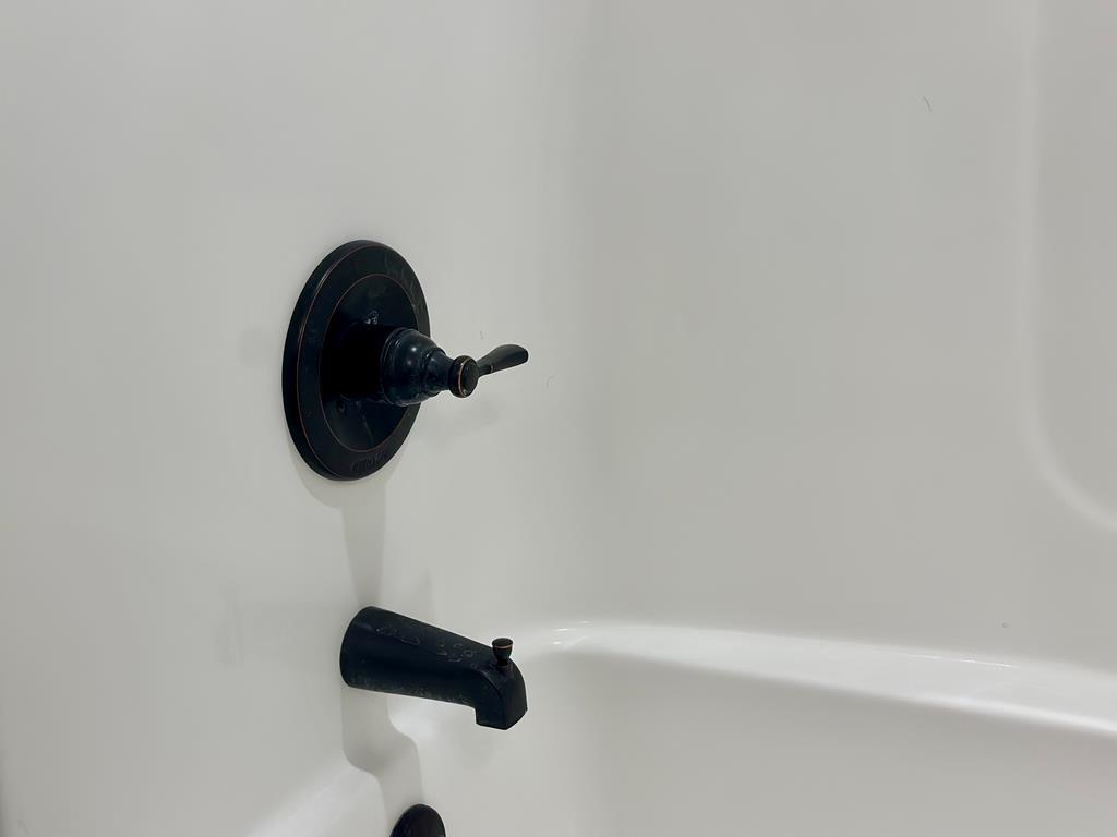 4603 Brees Way Valdosta, GA 31601 - Photo 25 of 31 a close up of a shower in a bathroom