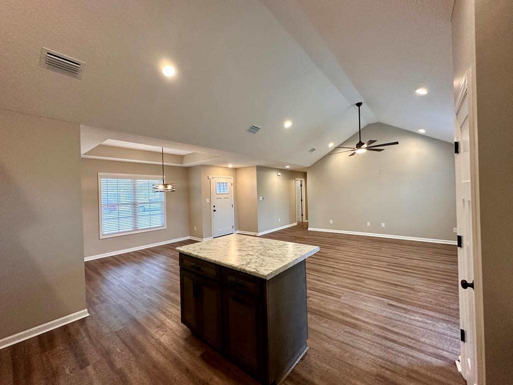 4603 Brees Way Valdosta, GA 31601 - Photo 3 of 31 a bathroom with a granite countertop sink and a mirror