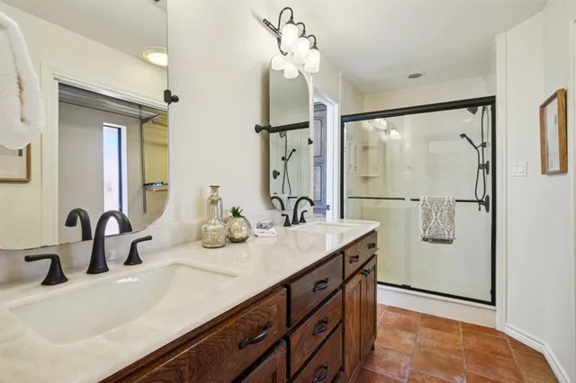 a bathroom with a sink and mirror