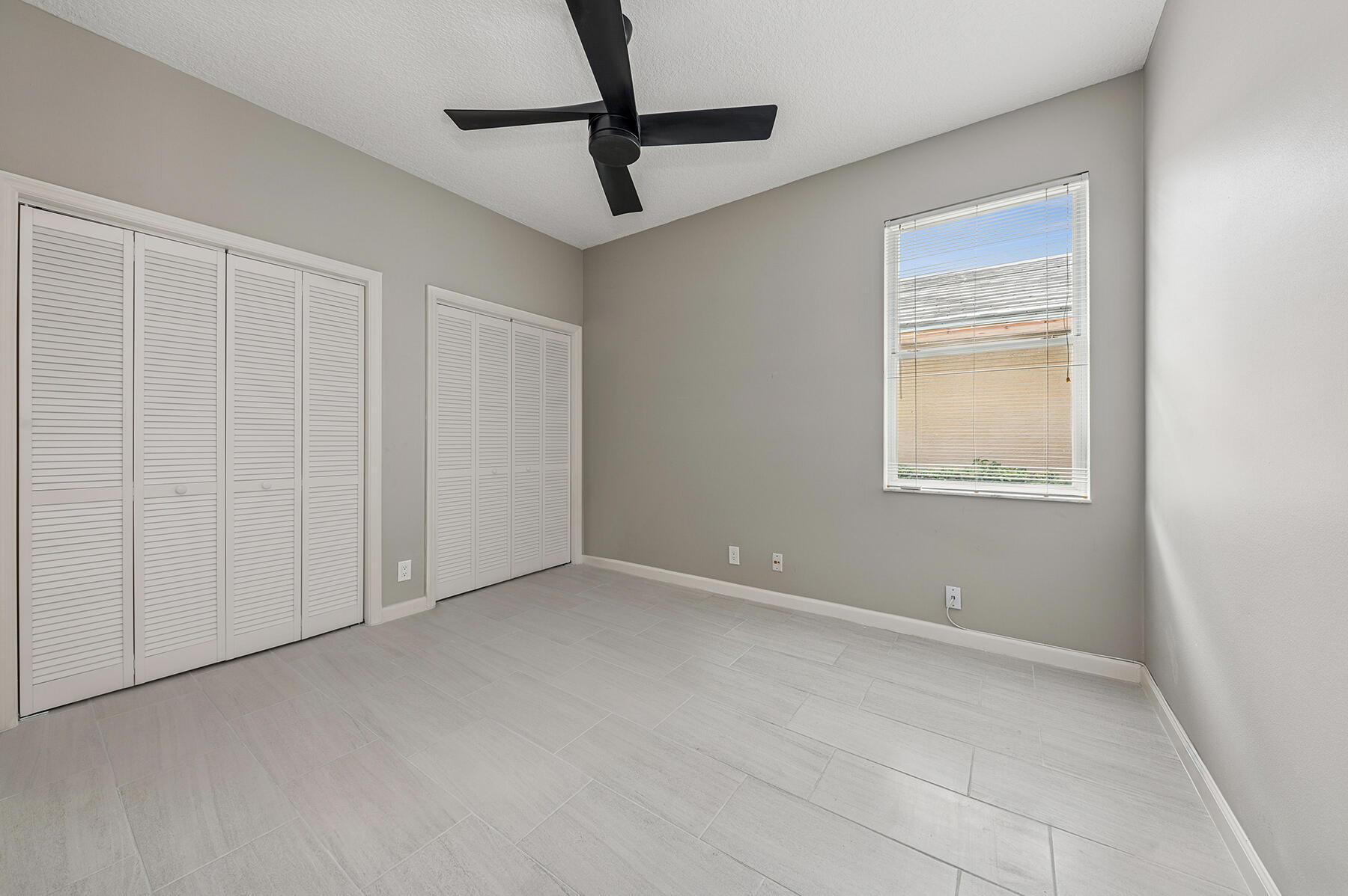 175 Harbor Lake Circle Greenacres, FL 33413 - Photo 12 of 33 a view of an empty room with a window