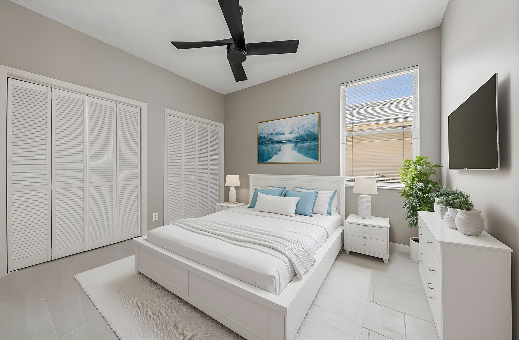 175 Harbor Lake Circle Greenacres, FL 33413 - Photo 13 of 33 a bedroom with a large bed and a flat screen tv