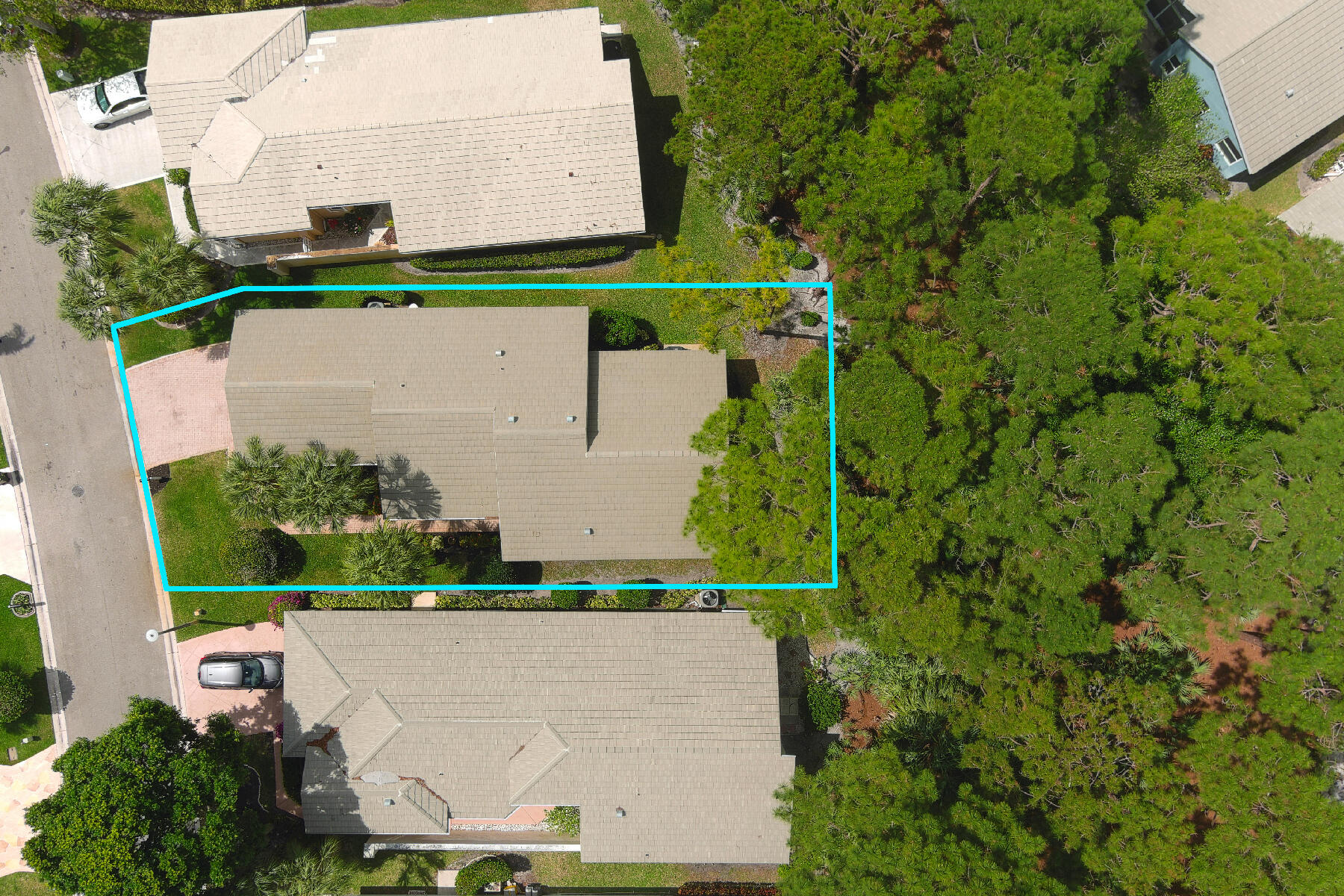 175 Harbor Lake Circle Greenacres, FL 33413 - Photo 24 of 33 an aerial view of a house with a garden and trees
