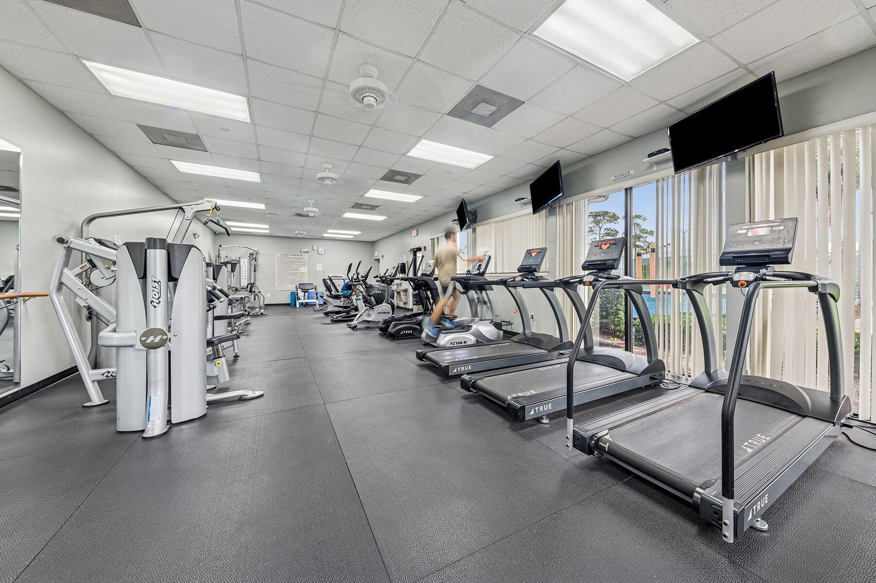175 Harbor Lake Circle Greenacres, FL 33413 - Photo 30 of 33 a view of a room with gym equipment