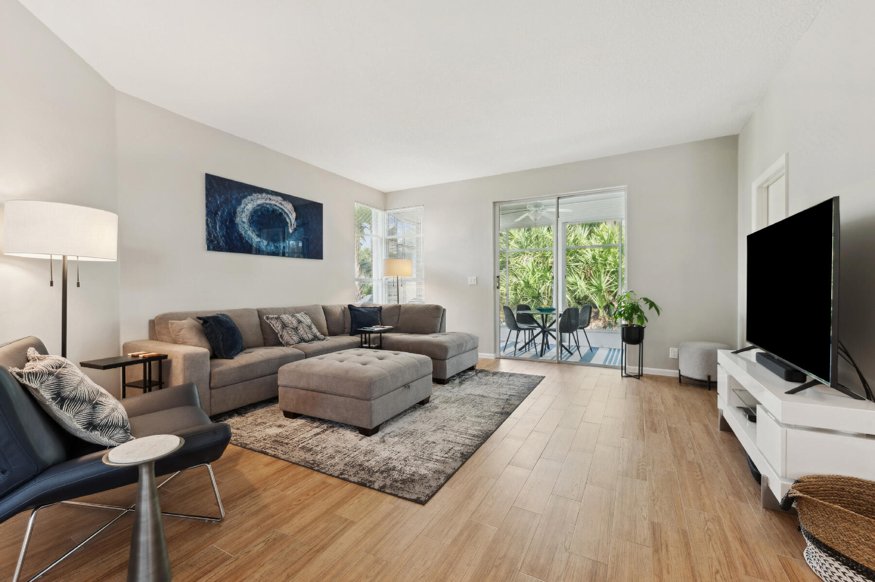 175 Harbor Lake Circle Greenacres, FL 33413 - Photo 9 of 33 a living room with furniture and a flat screen tv