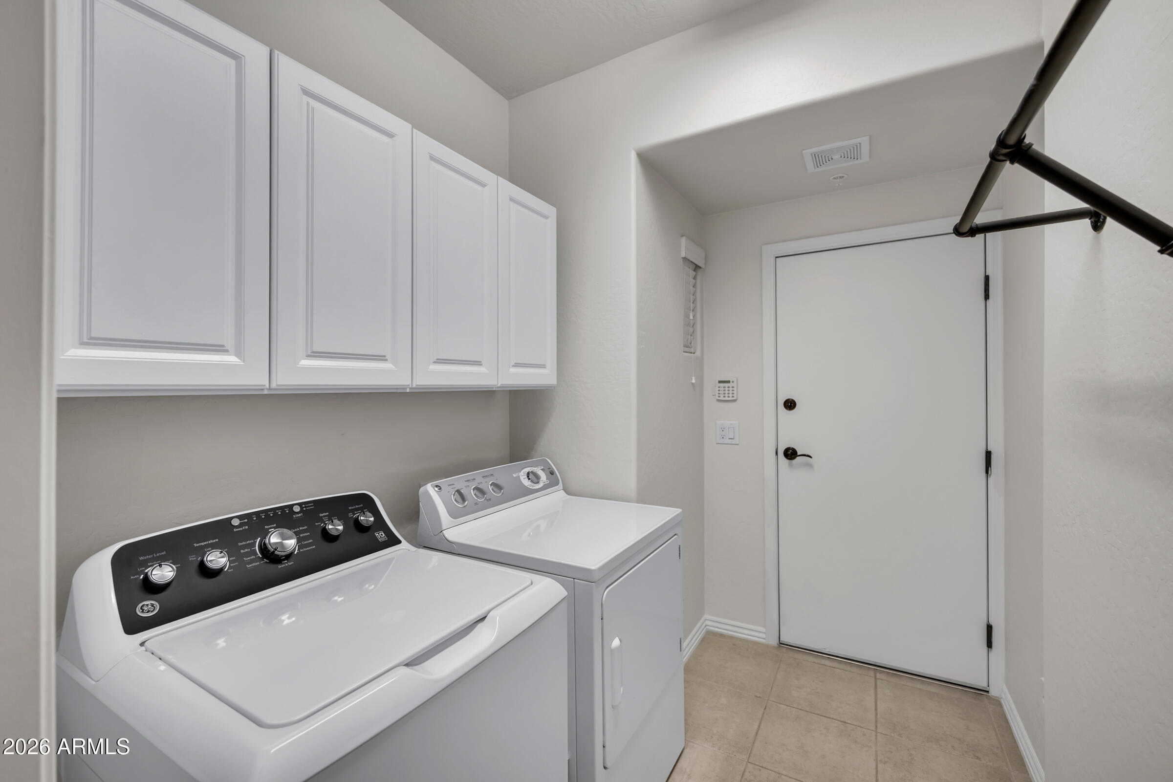3935 East Rough Rider Road, Unit 1250 Phoenix, AZ 85050 - Photo 24 of 29 a room with storage and utility