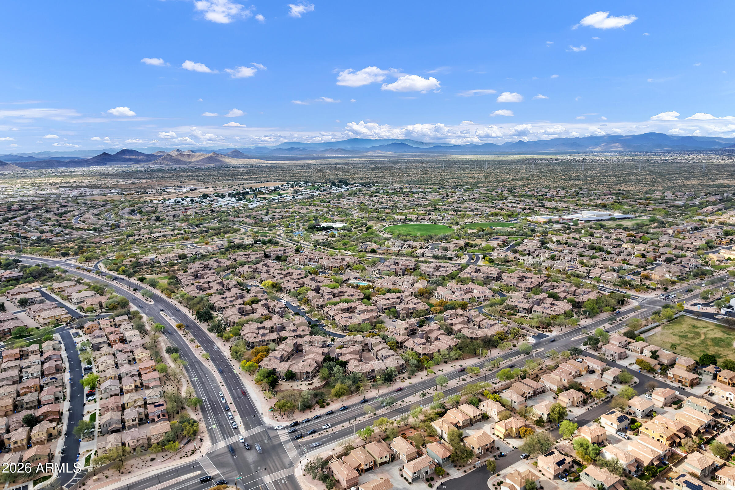 3935 East Rough Rider Road, Unit 1250 Phoenix, AZ 85050 - Photo 28 of 29 an aerial view of a city