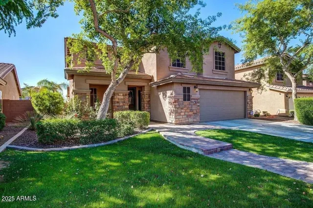 front view of house with a yard