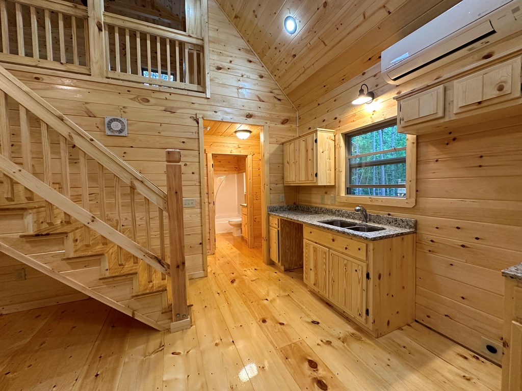 24 Lakeside View Trail Murphy, NC 28906 - Photo 14 of 20 a kitchen with stainless steel appliances granite countertop a stove and a cabinets