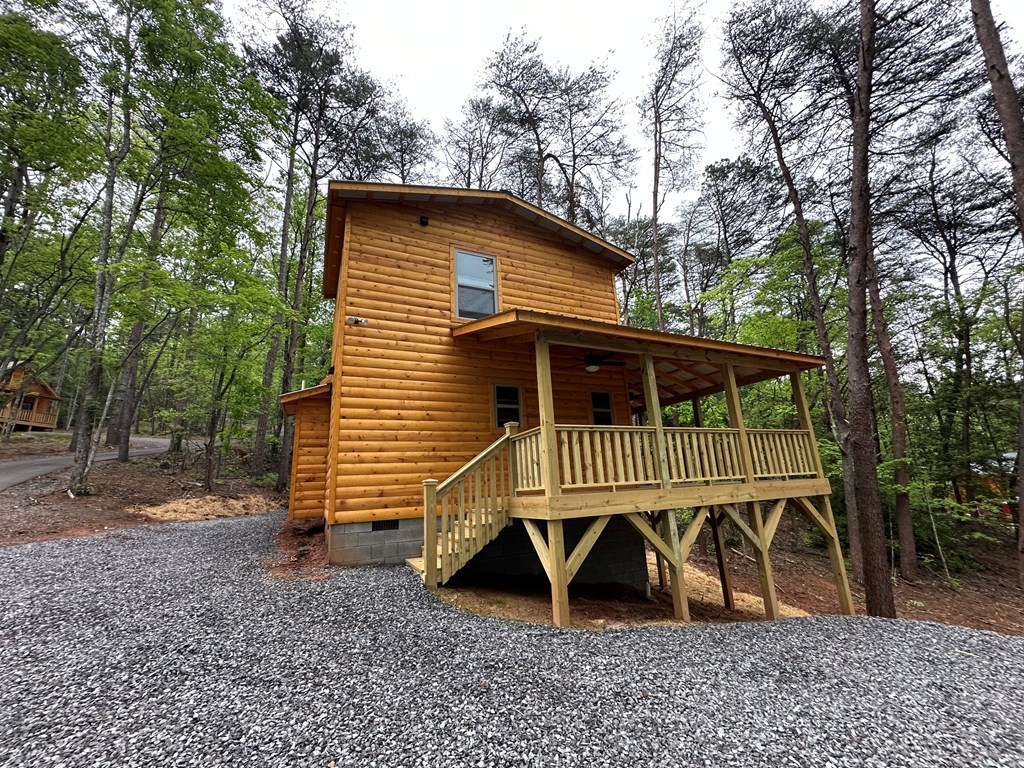 24 Lakeside View Trail Murphy, NC 28906 - Photo 6 of 20 a view of a house with a yard swing and a slide