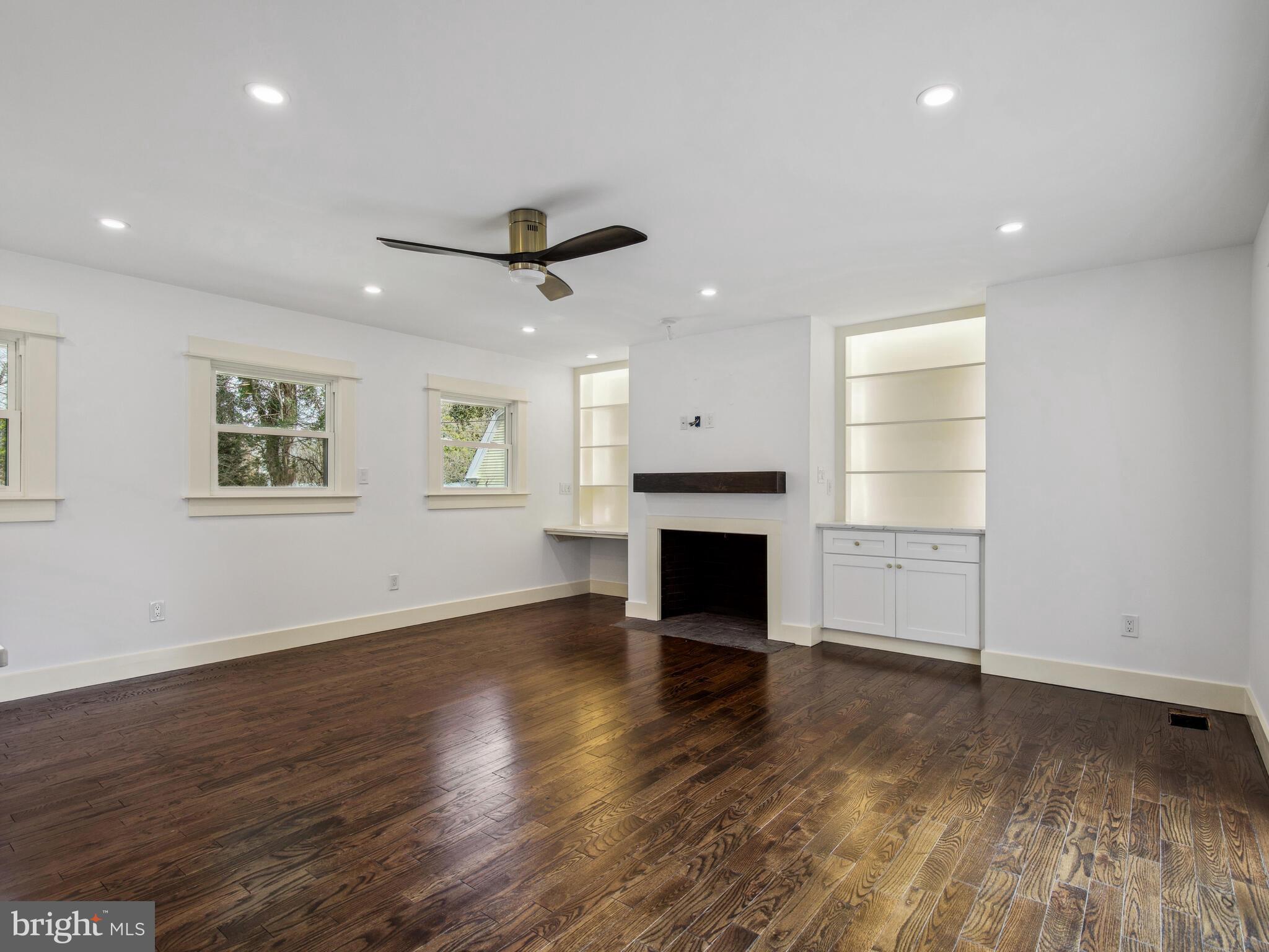2 Campbelton Circle Princeton, NJ 08540 - Photo 28 of 55 Family room fireplace with built in shelving