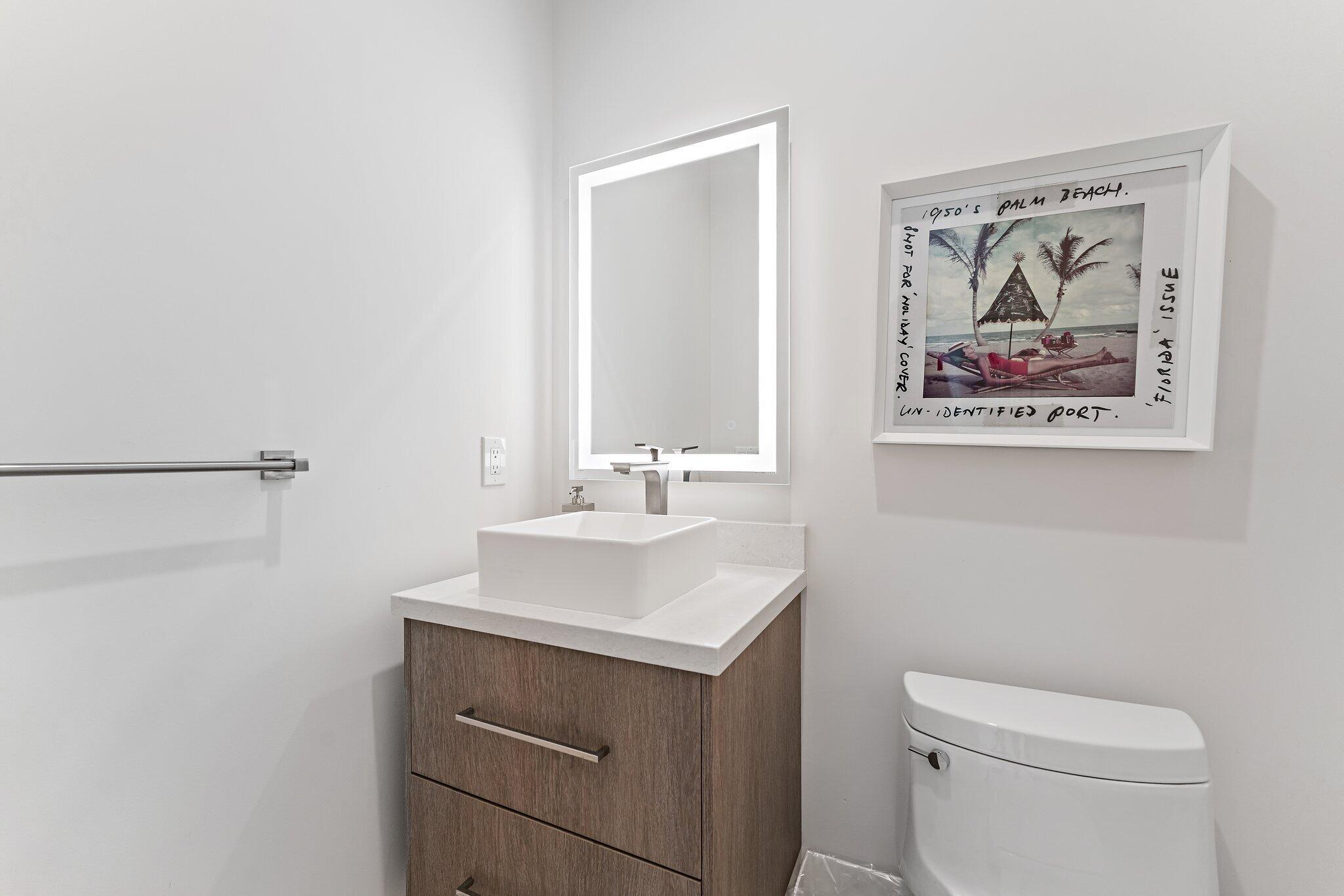 2162 Radnor Road North Palm Beach, FL 33408 - Photo 29 of 71 1st FL Powder Room