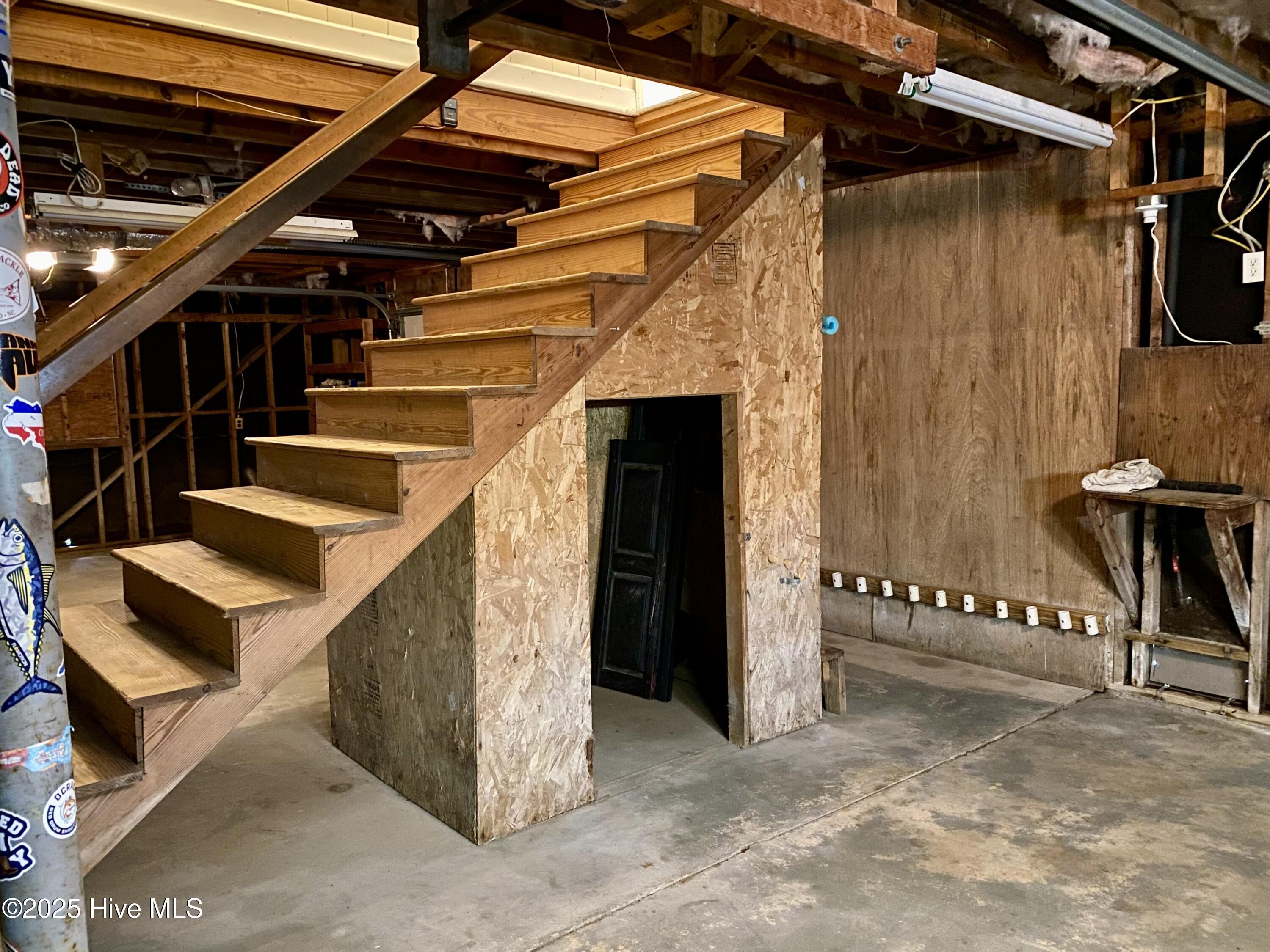 112 Croaker Street Davis, NC 28524 - Photo 26 of 28 Storage under stairs