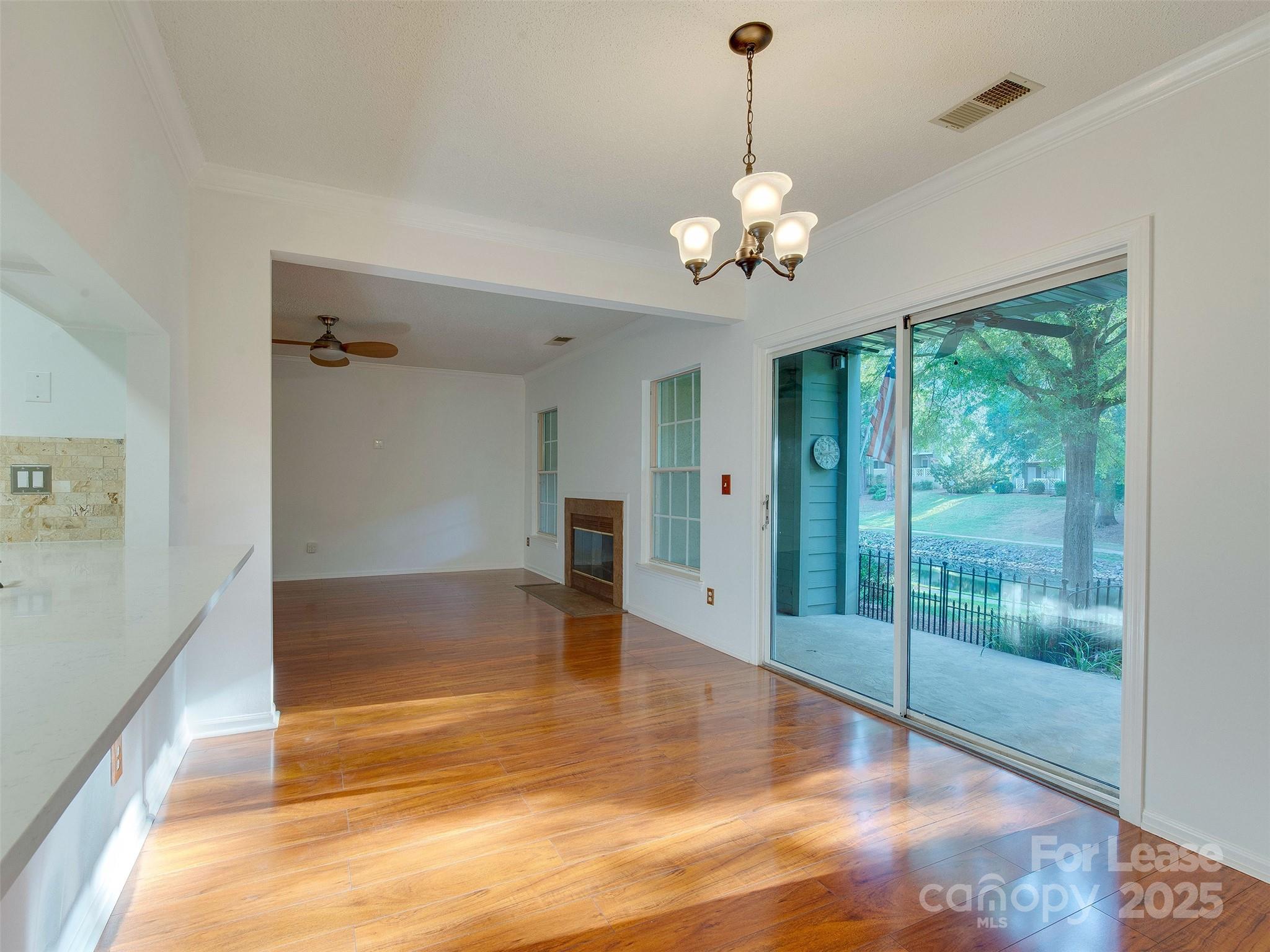 19827 Henderson Road, Unit B Cornelius, NC 28031 - Photo 12 of 48 a view of an empty room with a window