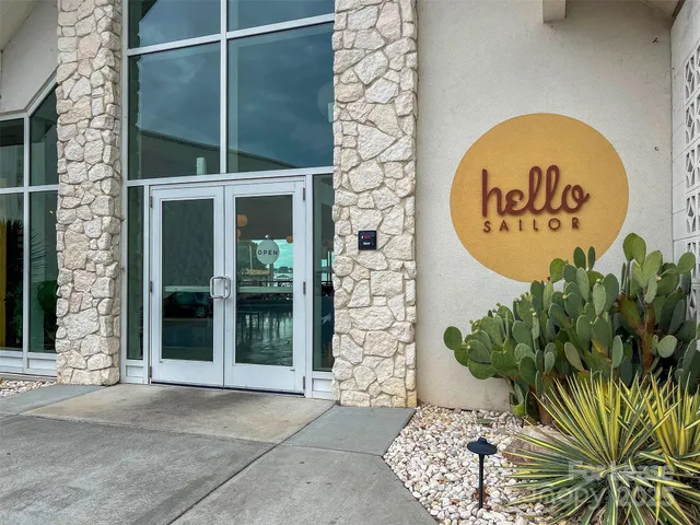 a sign that is on the side of a building