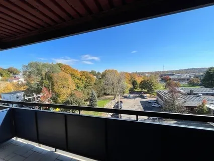 a view of a city from a balcony