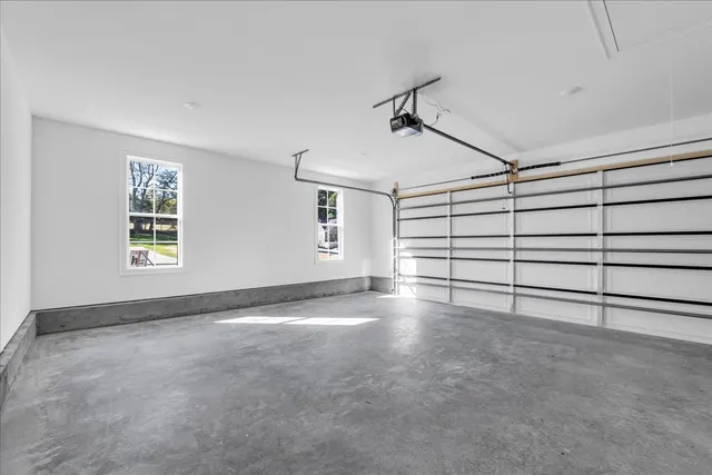 a view of a livingroom with an empty space and a window