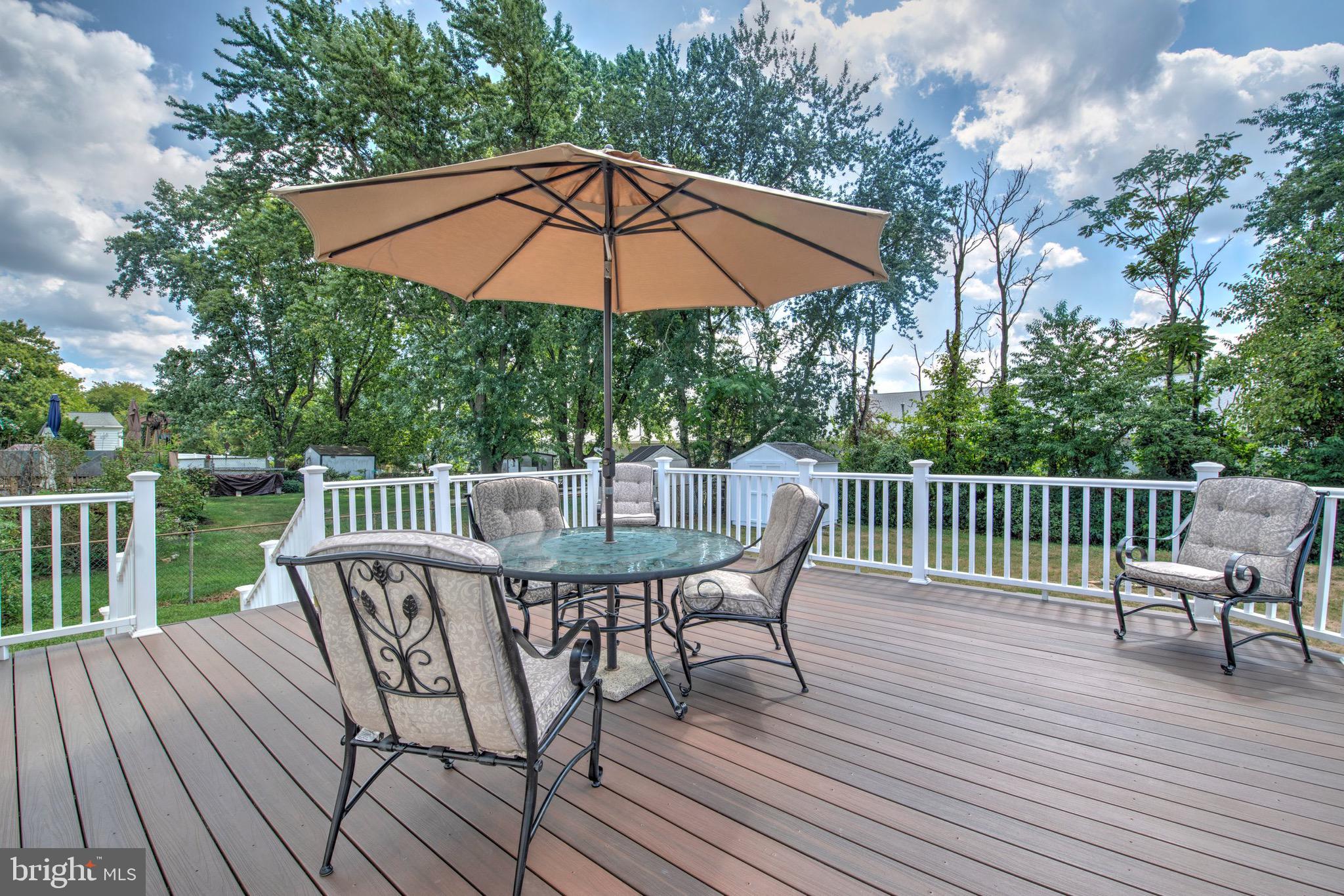 613 Howell Drive Westampton, NJ 08060 - Photo 14 of 18 a view of balcony with wooden floor and outdoor seating