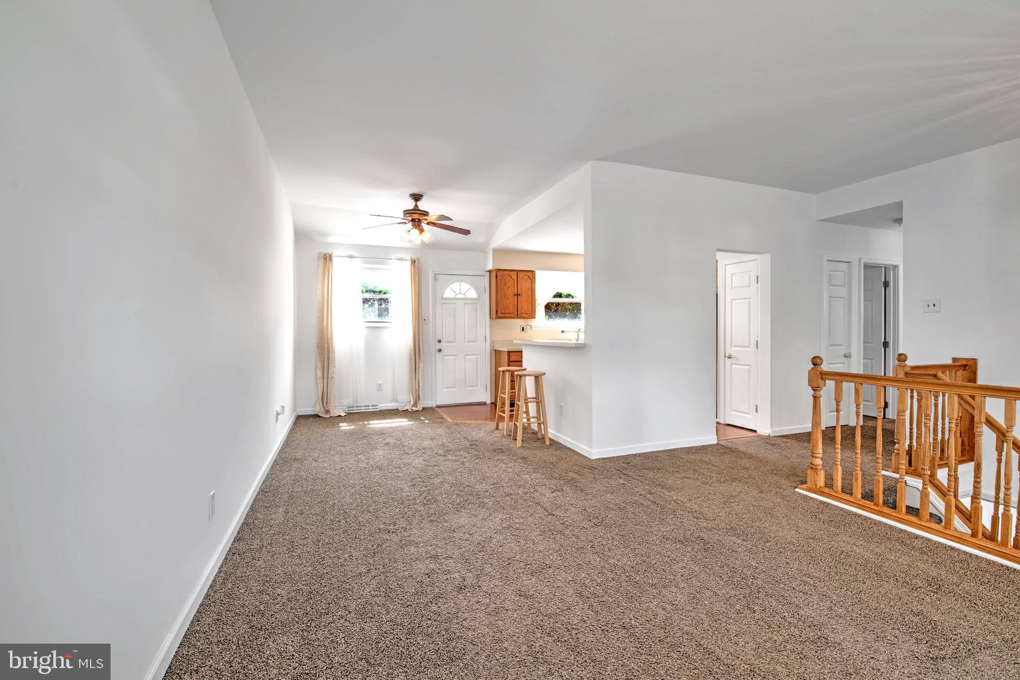 613 Howell Drive Westampton, NJ 08060 - Photo 3 of 18 wooden floor in an empty room with a window