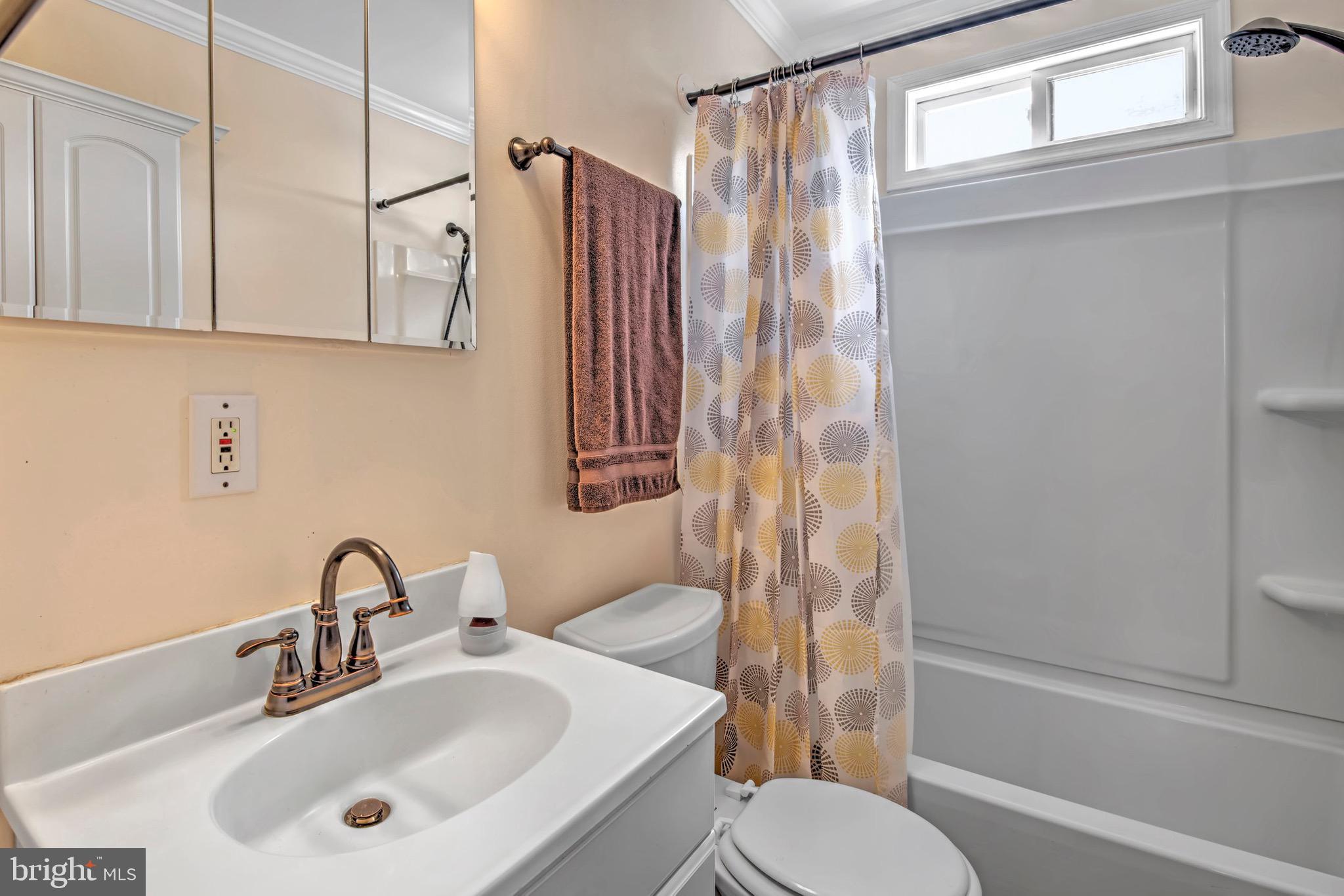 613 Howell Drive Westampton, NJ 08060 - Photo 9 of 18 a bathroom with a sink toilet and shower