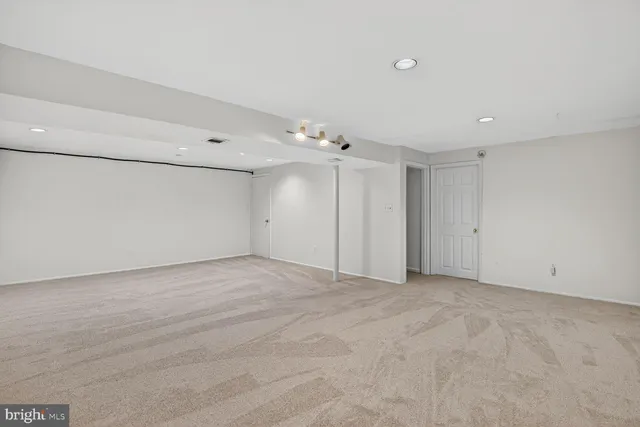 a view of a wooden deck and city view