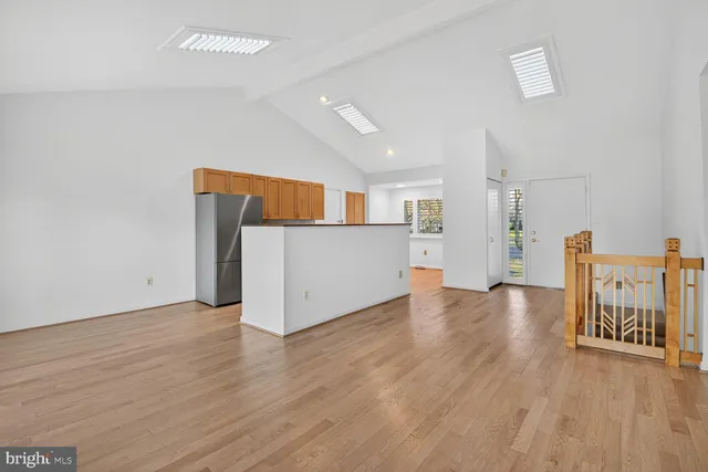 a view of a kitchen with a wooden floor